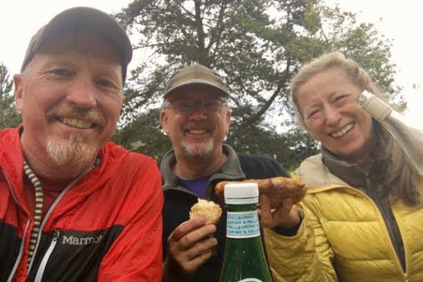 a person holding a bottle of wine