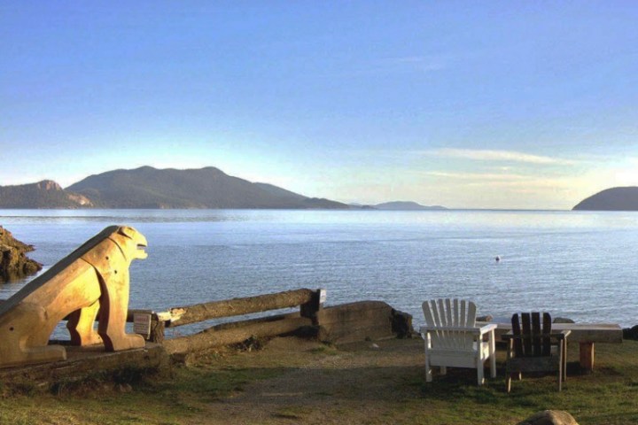a bench in front of a body of water