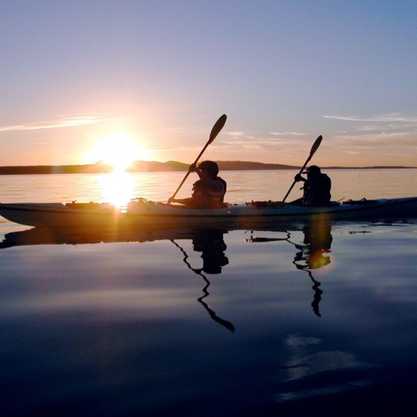 a small boat in a body of water