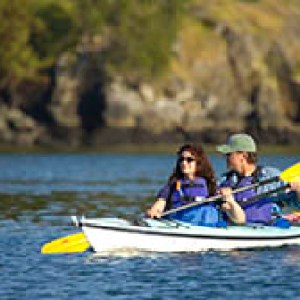 man and woman in a kayak