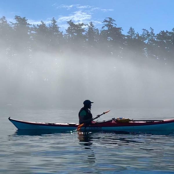 kayaker in the mist